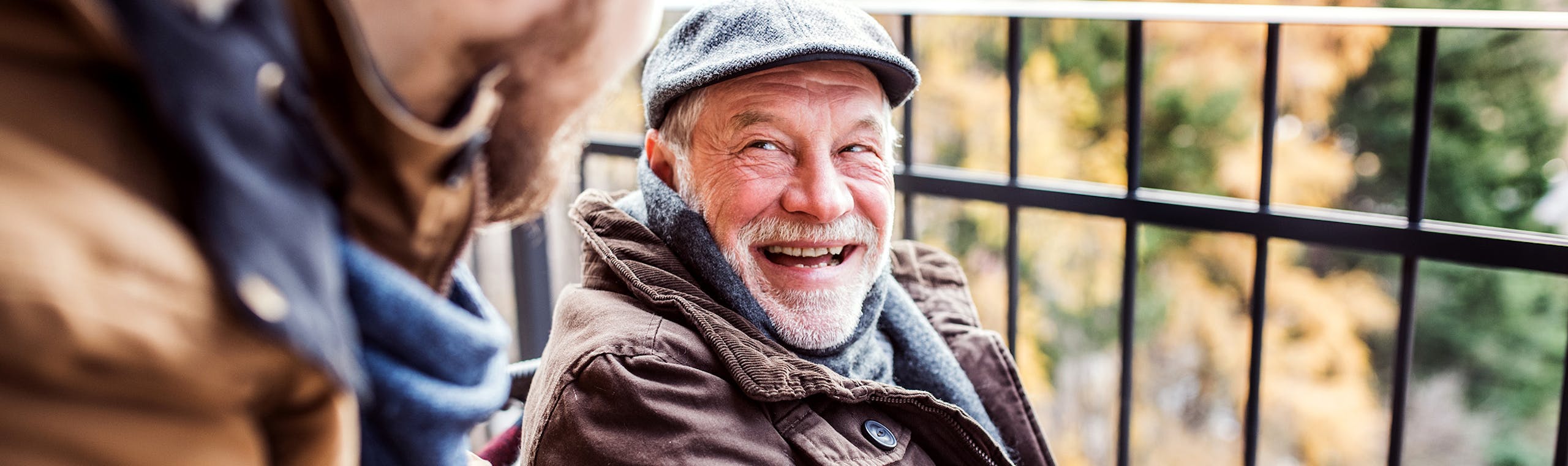 Carer and client out in the park for a walk
